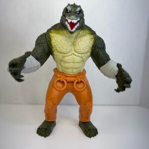 DC Comics Reptilian Figure with Orange and Green Colors